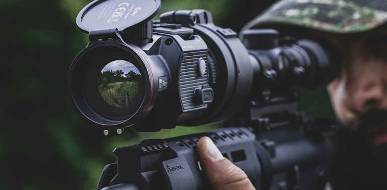 Man hunting with an optic purchased at TCH Gear.